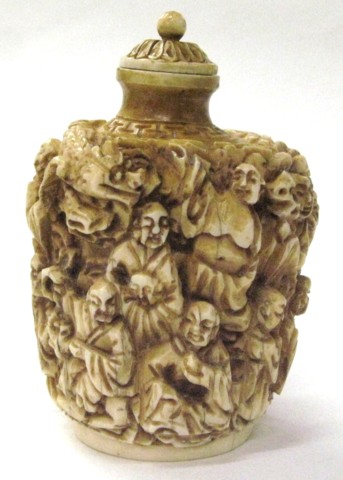 Appraisal: A CHINESE IVORY HAND CARVED SNUFF MEDICINE BOTTLE having numerous