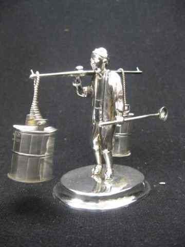 Appraisal: Japanese Sterling Figural Salt Pepper man carrying buckets '' marked