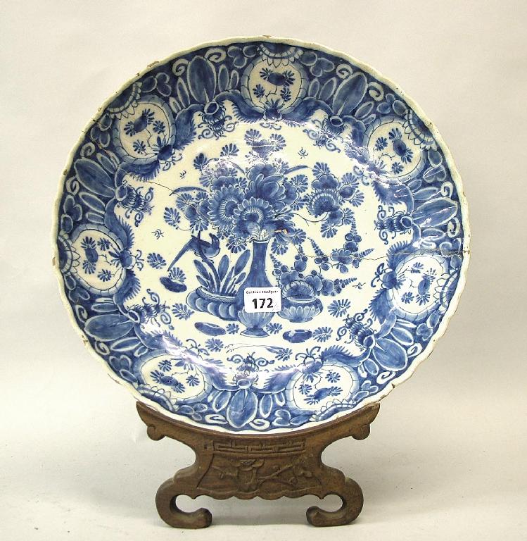 Appraisal: th century Delft chinoiserie blue and white painted lobed bowl