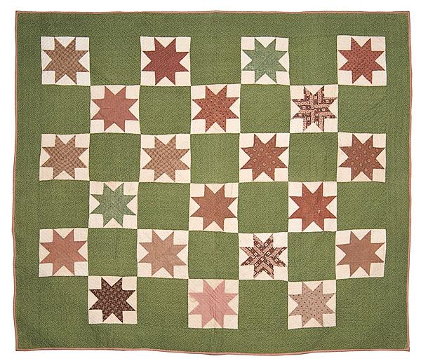 Appraisal: STAR PATTERN QUILT American ca - printed and solid cotton