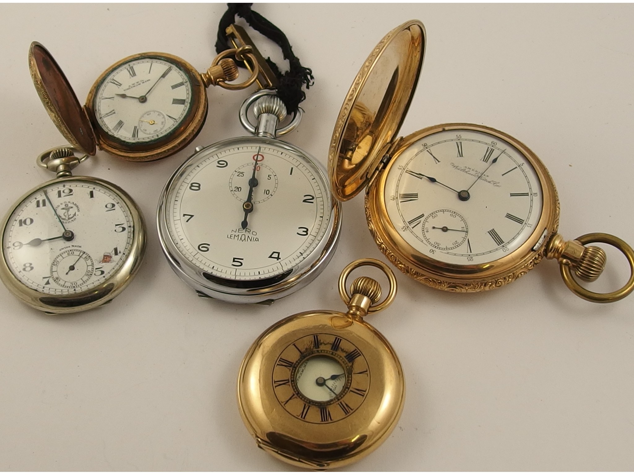 Appraisal: A collection of gold plated and metal pocket watches to