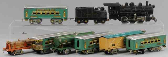 Appraisal: AMERICAN FLYER TRAIN LOT Grouping includes the - - engine