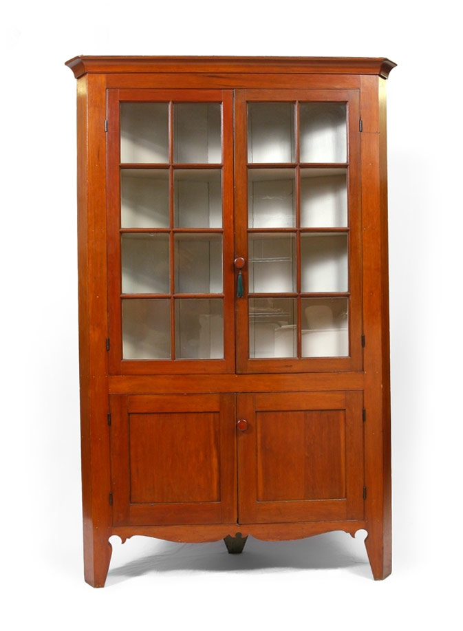 Appraisal: TH CENTURY CHERRY CORNER CABINET Straight cornice top section with