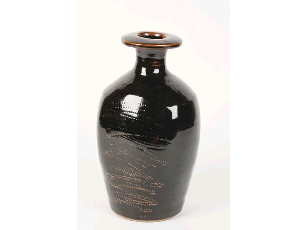 Appraisal: DAVID LEACH A TENMOKU GLAZED VASE with a flared rim