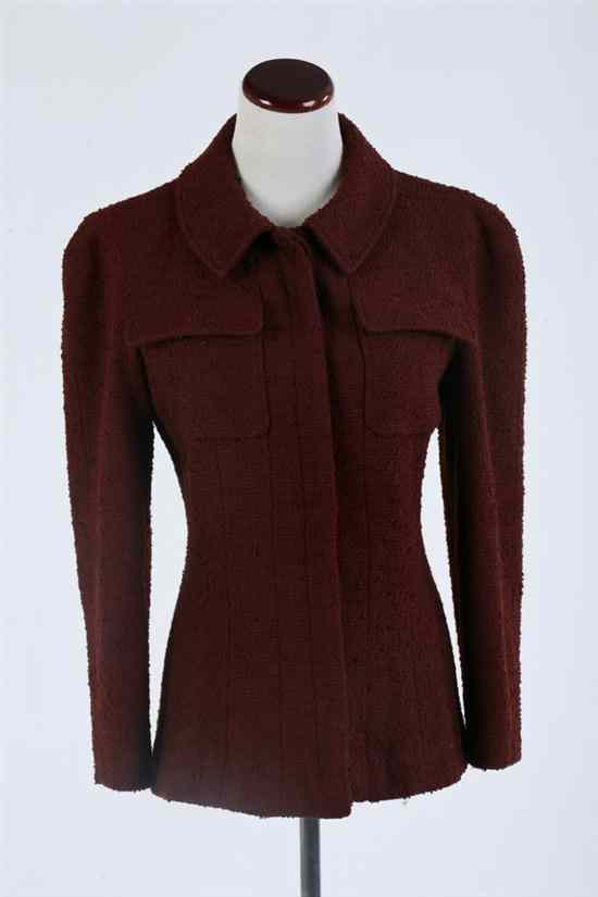 Appraisal: CHANEL RUST WOOL BOUCL JACKET Fall collection Chanel Boutique size