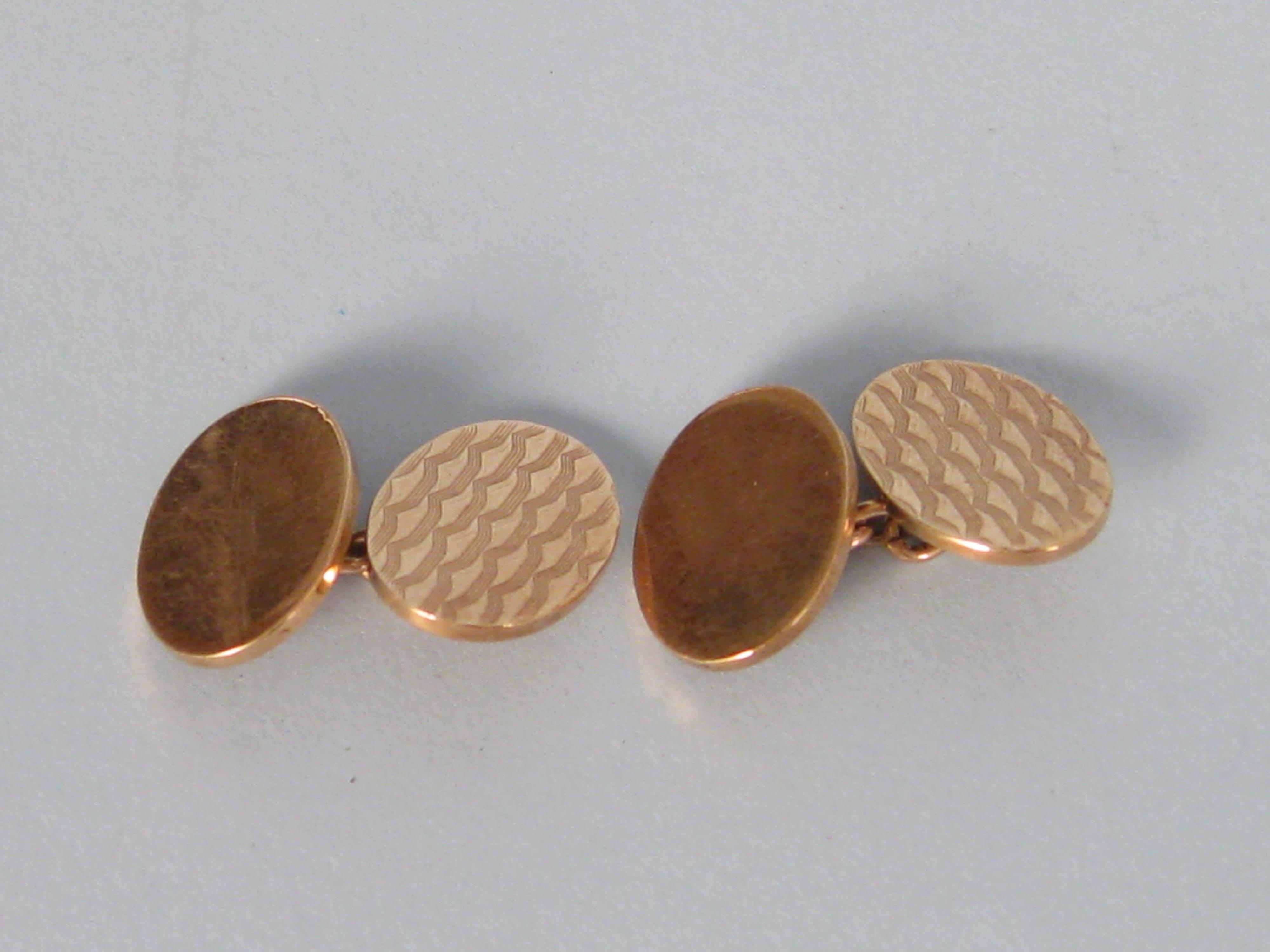 Appraisal: A pair of ct gold engine turned Cufflinks approx gms