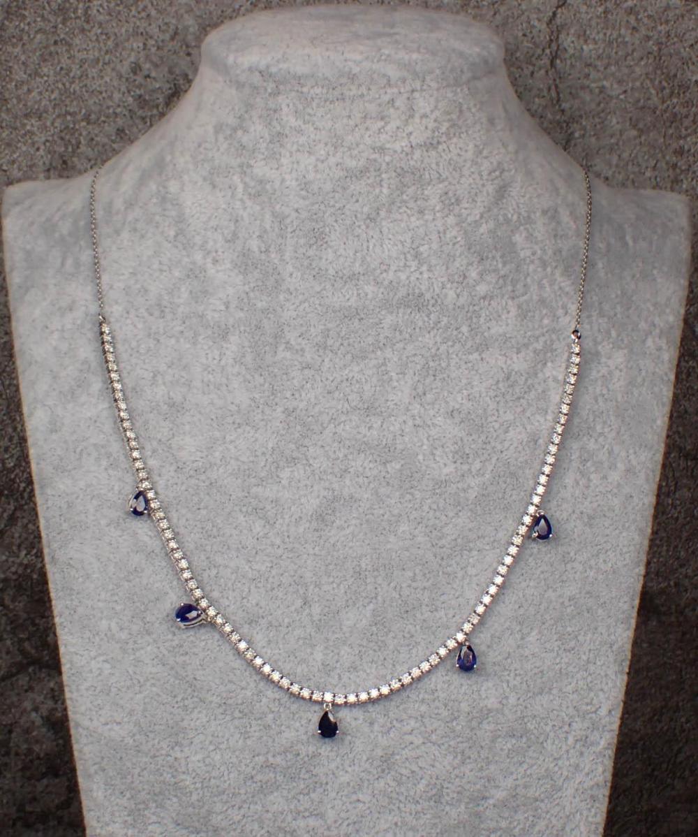 Appraisal: DIAMOND SAPPHIRE AND FOURTEEN KARAT GOLD NECKLACE The k white