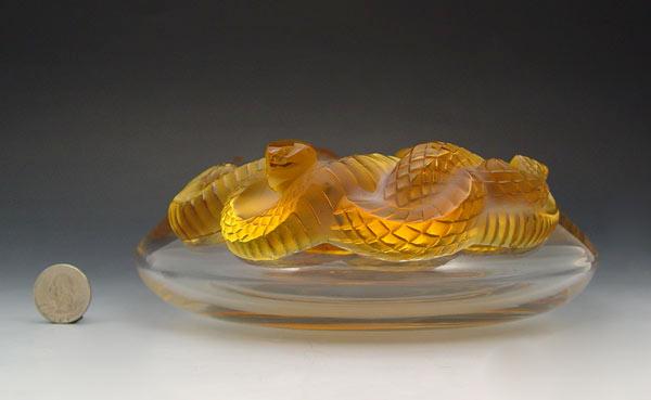 Appraisal: LALIQUE FRENCH CRYSTAL SERPENT BOWL Two color Lalique amber serpents