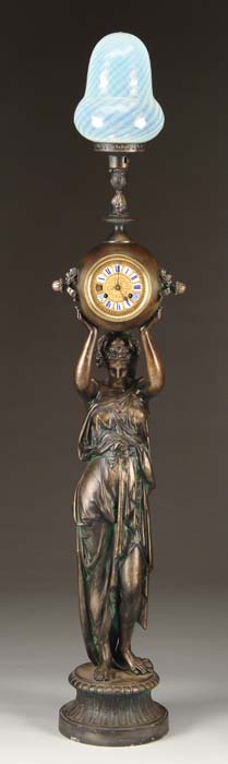 Appraisal: LARGE FIGURAL CLOCK WITH LIGHT h Greek woman figure stands