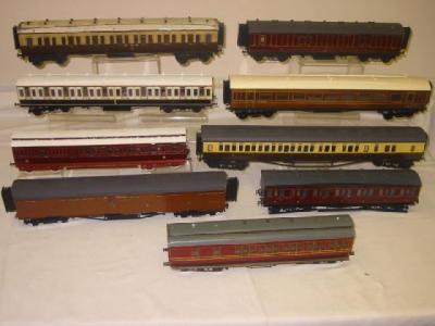 Appraisal: Nine coaches handmade from wood plastic and tin some with