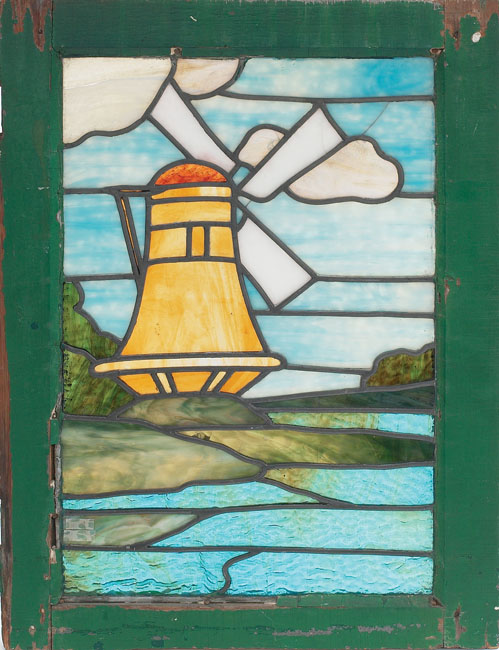 Appraisal: Arts amp Crafts stained glass window windmill design in an