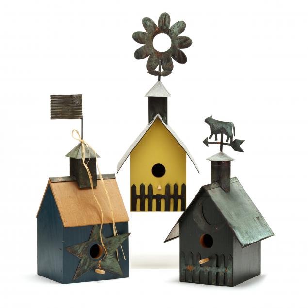 Appraisal: THREE CHARMING FOLKY BIRD HOUSES Late th century painted wood