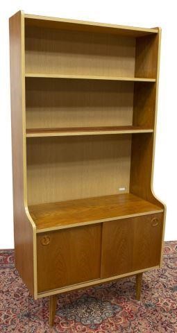 Appraisal: Danish mid-century modern bookcase c s upper section fitted with