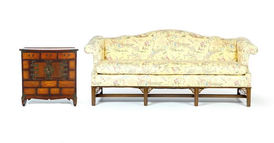 Appraisal: CHINESE CABINET AND A CHIPPENDALE-STYLE CAMEL BACK SOFA Cabinet is