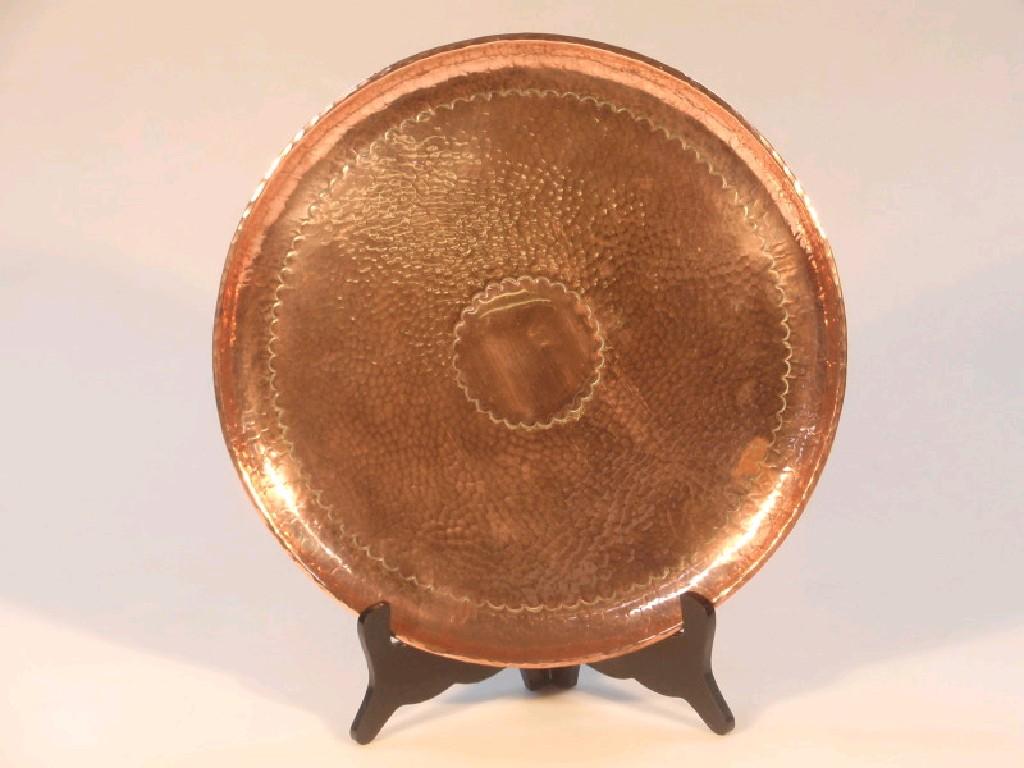 Appraisal: A Newlyn hammered copper circular tray impressed mark cm diameter