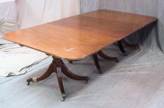 Appraisal: Georgian Triple Pedestal Dining Table With three leaves - -