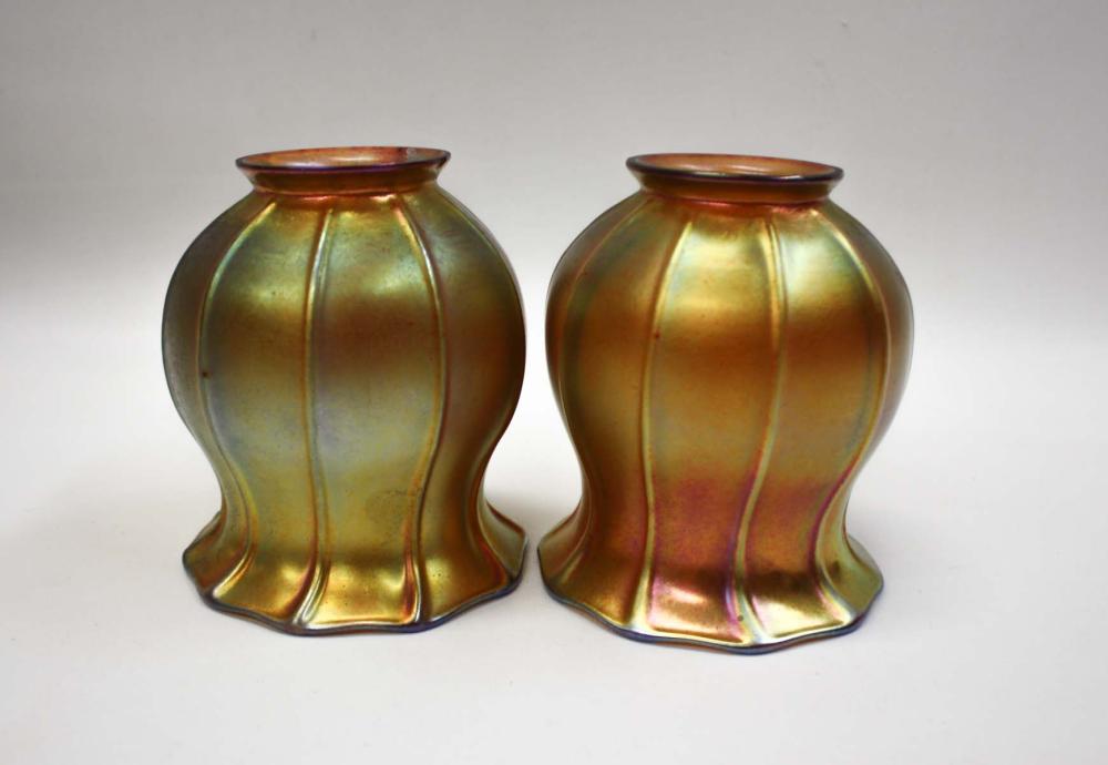 Appraisal: PAIR OF STEUBEN GOLD IRIDESCENT ART GLASS SHADES with shaped