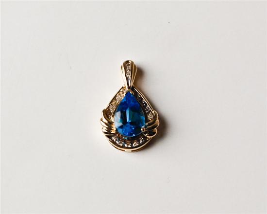 Appraisal: Pear Shaped Blue Topaz Pendant with Diamond in Gold Mounting