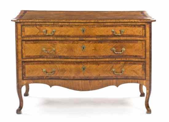 Appraisal: A Continental Parquetry Commode having a serpentine top over three