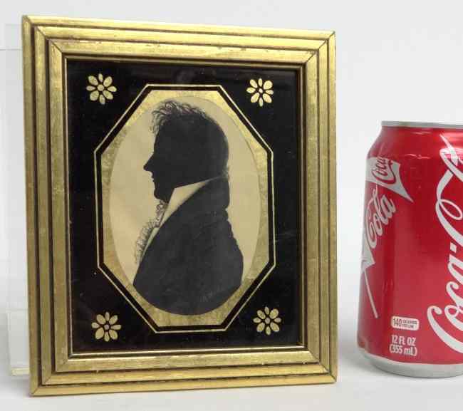 Appraisal: th c silhouette man in reverse painted frame Provenance written