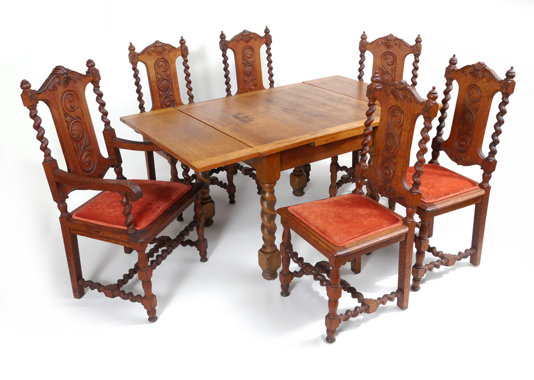 Appraisal: CARVED OAK DRAW LEAF DINING TABLE WITH CHAIRS Oak table