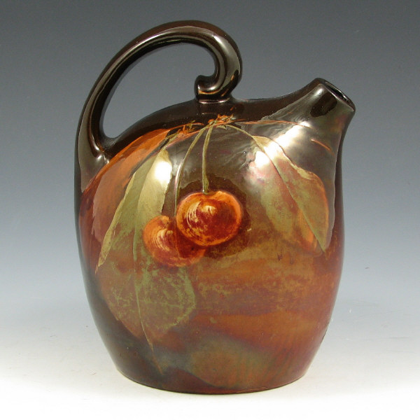 Appraisal: Owens Standard Glaze Handled Jug with Cherries Very nice Owens