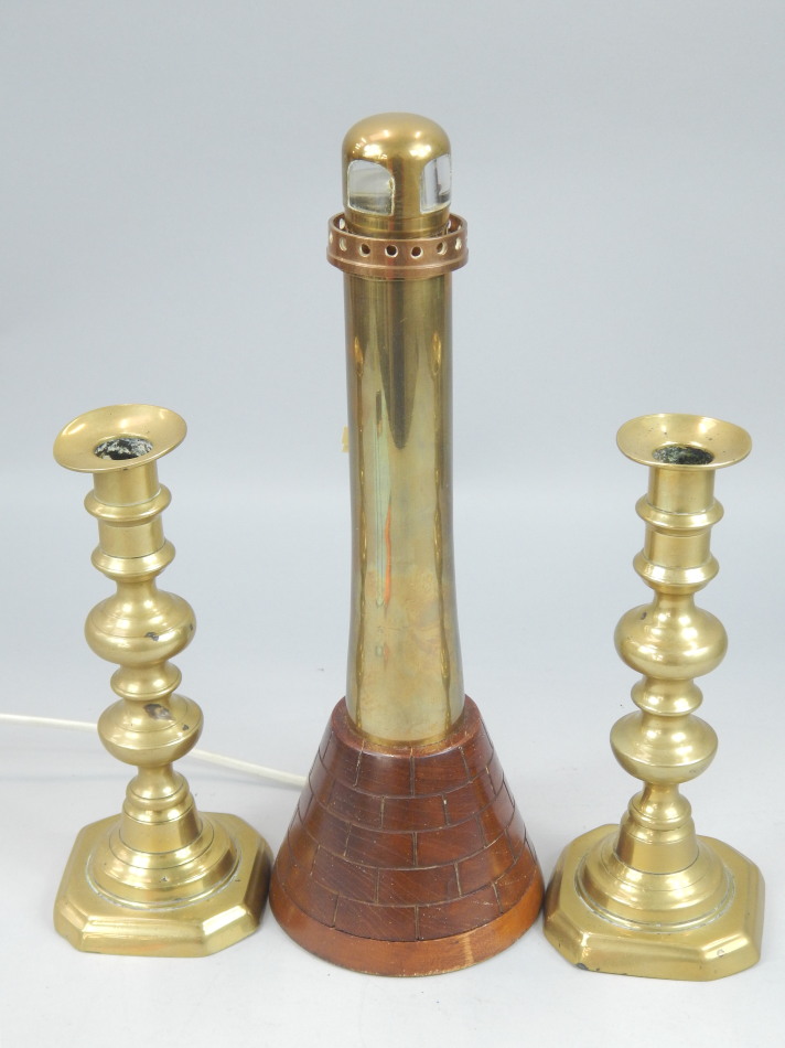 Appraisal: A novelty brass copper and treen lamp base modelled in