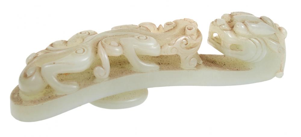 Appraisal: A CHINESE CARVED JADE BELT HOOK WITH QILIN TH TH