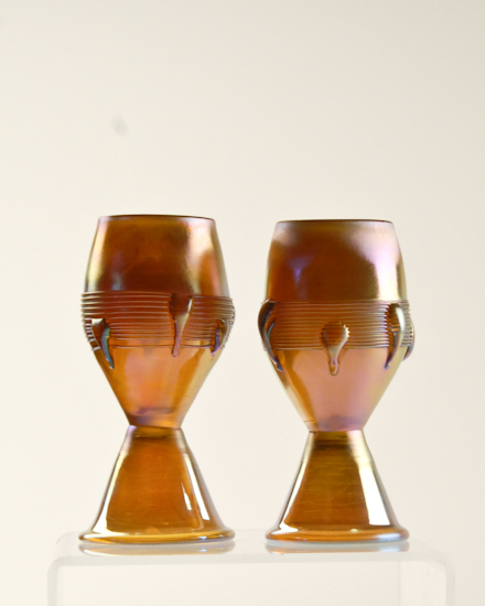 Appraisal: Two Tiffany Favrile Footed Cordials in iridescent gold with threaded