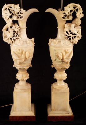 Appraisal: A pair of Italian alabaster ewer-shaped lamps encrusted with flowers