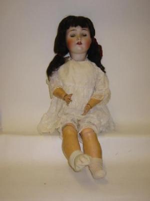 Appraisal: A Kestner bisque head doll with brown sleeping eyes open