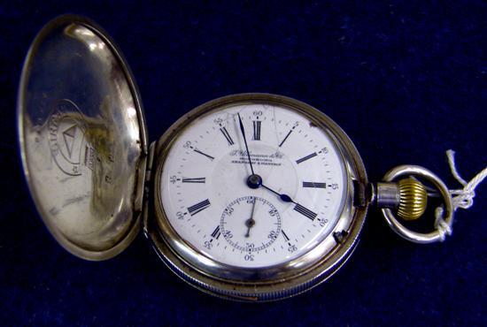 Appraisal: A SWISS HUNTING WATCH with a white enamelled dial inscribed