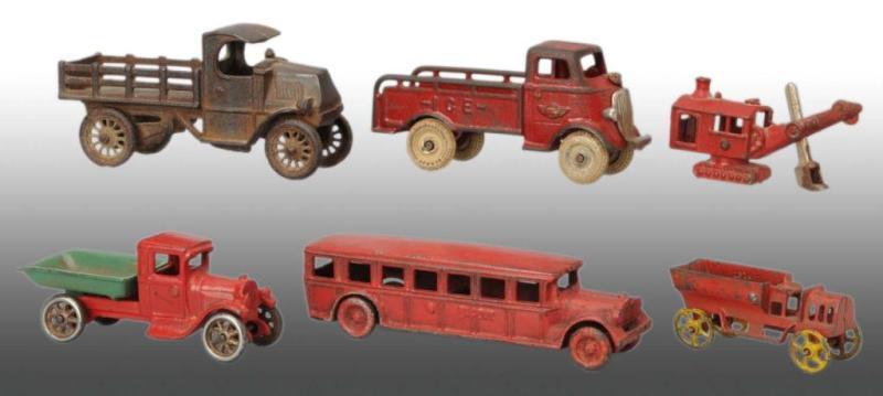 Appraisal: Lot of Cast Iron Vehicle Toys Description American Largest is