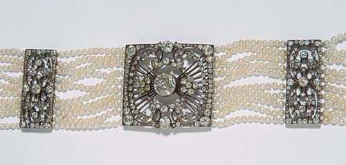 Appraisal: DIAMOND AND PEARL BRACELET ca Silver over ros gold Very