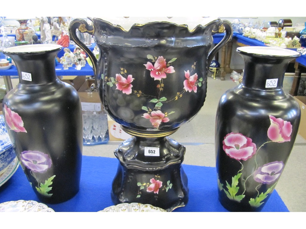 Appraisal: Pair of Empire Works pottery vases decorated with poppies on