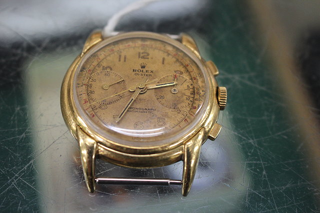 Appraisal: A YELLOW METAL WRIST WATCH with chronograph type dial cm