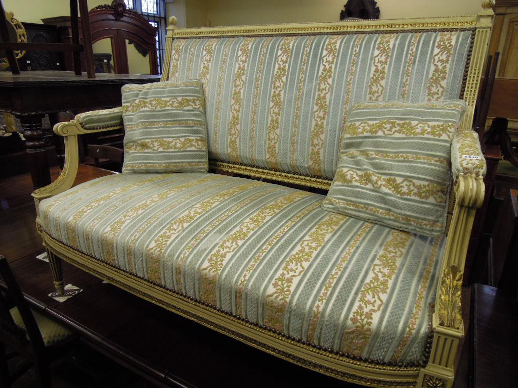 Appraisal: A continental two seat drawing room sofa with alternating striped