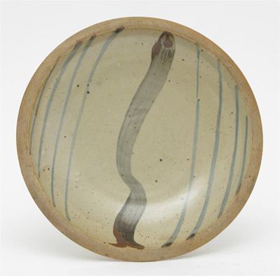 Appraisal: A St Ives stoneware charger painted with a willow tree