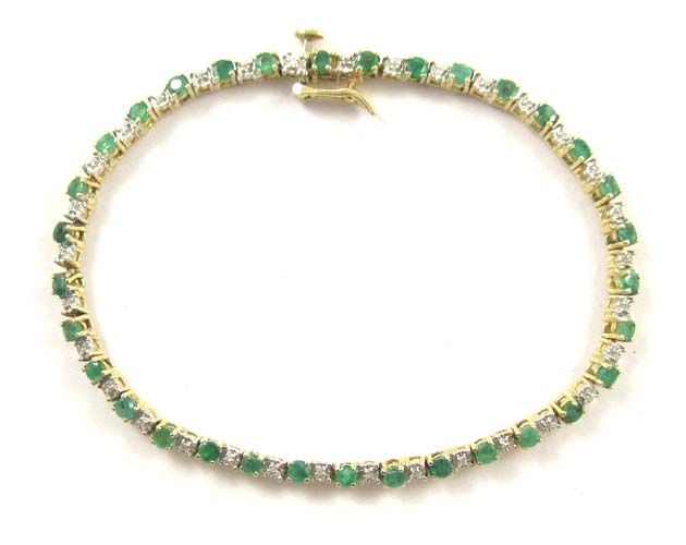 Appraisal: EMERALD DIAMOND AND FOURTEEN KARAT GOLD BRACELET inches in length