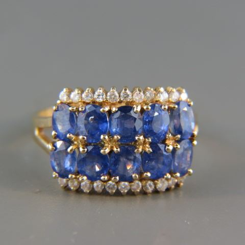 Appraisal: Sapphire Diamond Ring rich blue oval gems totaling carats and