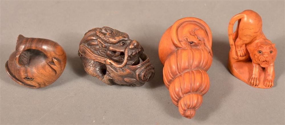 Appraisal: Four Animal Form Finley Carved Wood Netsukes Four Animal Form