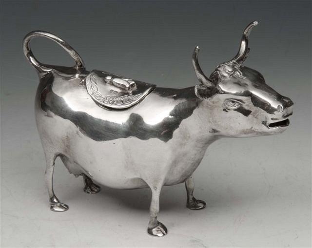 Appraisal: A CONTINENTAL SILVER CREAMER in the form of a cow