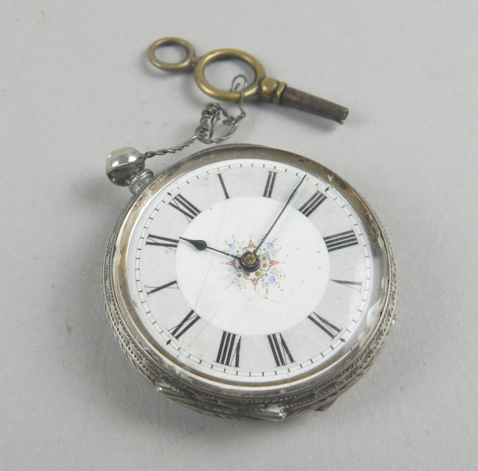 Appraisal: A white metal fob watch engraved with scrolls etc and