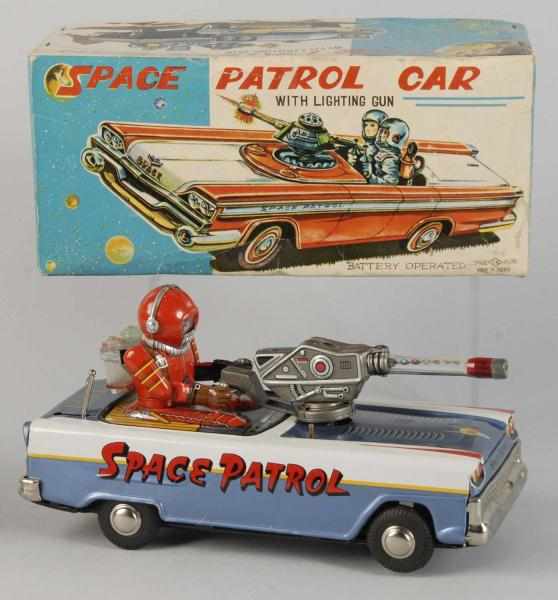 Appraisal: Tin Litho Space Patrol Car Battery-Op Toy Description Japanese Working