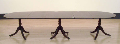 Appraisal: Regency style three pedestal dining table h w d