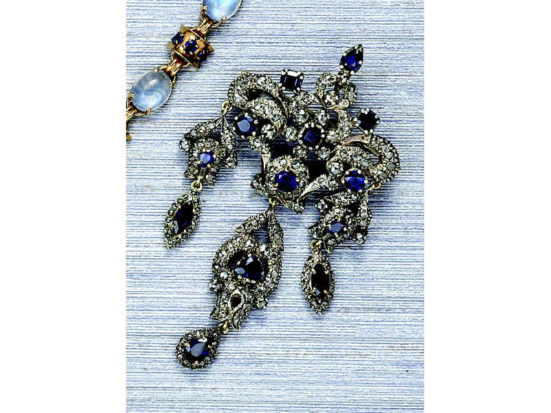 Appraisal: SAPPHIRE AND DAMOND BROOCH PENDANT Silver over gold set with