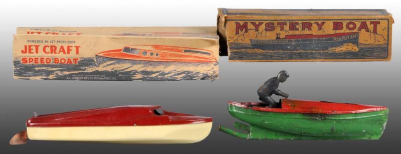 Appraisal: Lot of Boxed Pop-Pop Boats Description The Mystery Boat is