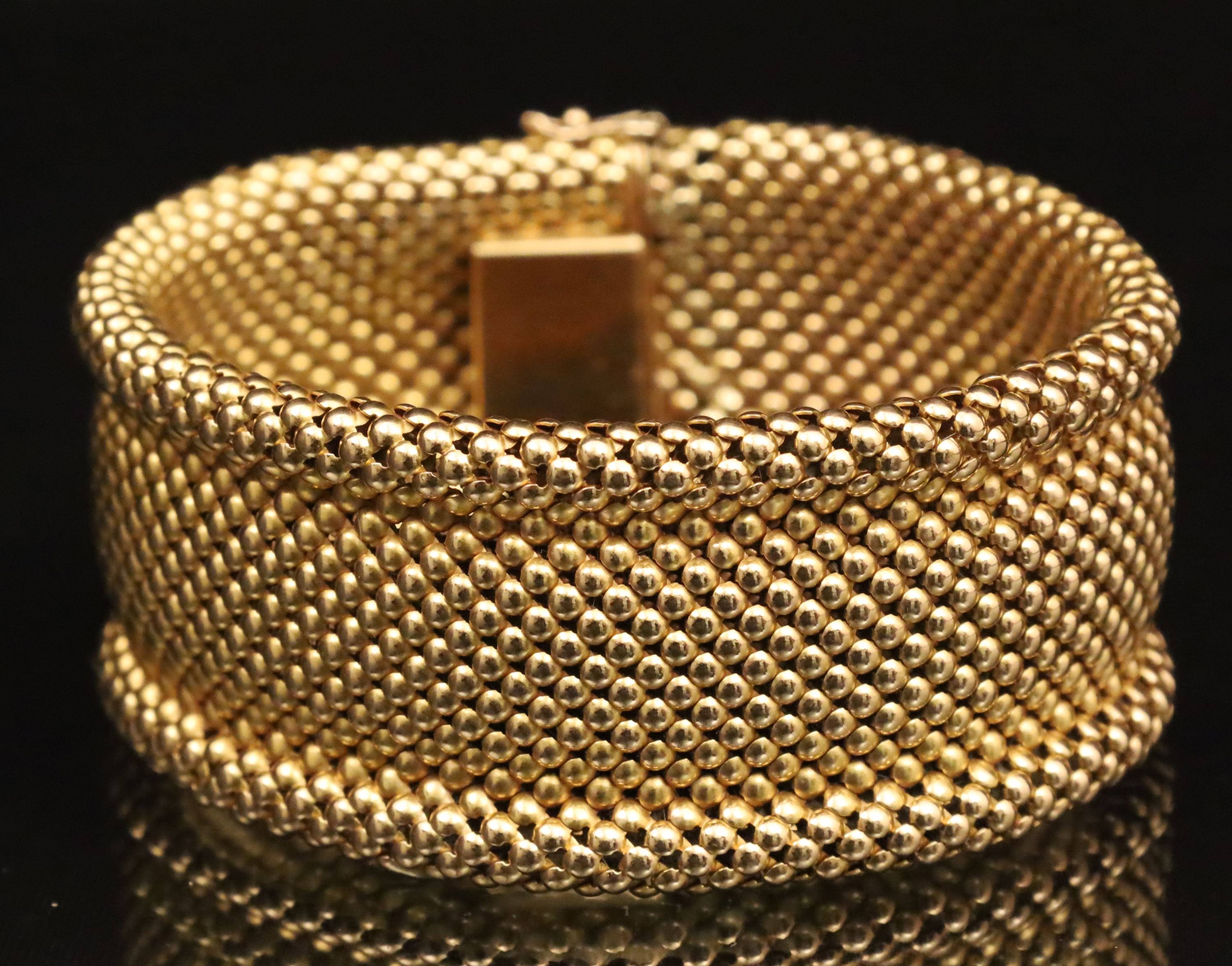 Appraisal: K YG FLEXIBLE BEADED MESH BRACELET K yellow gold flexible