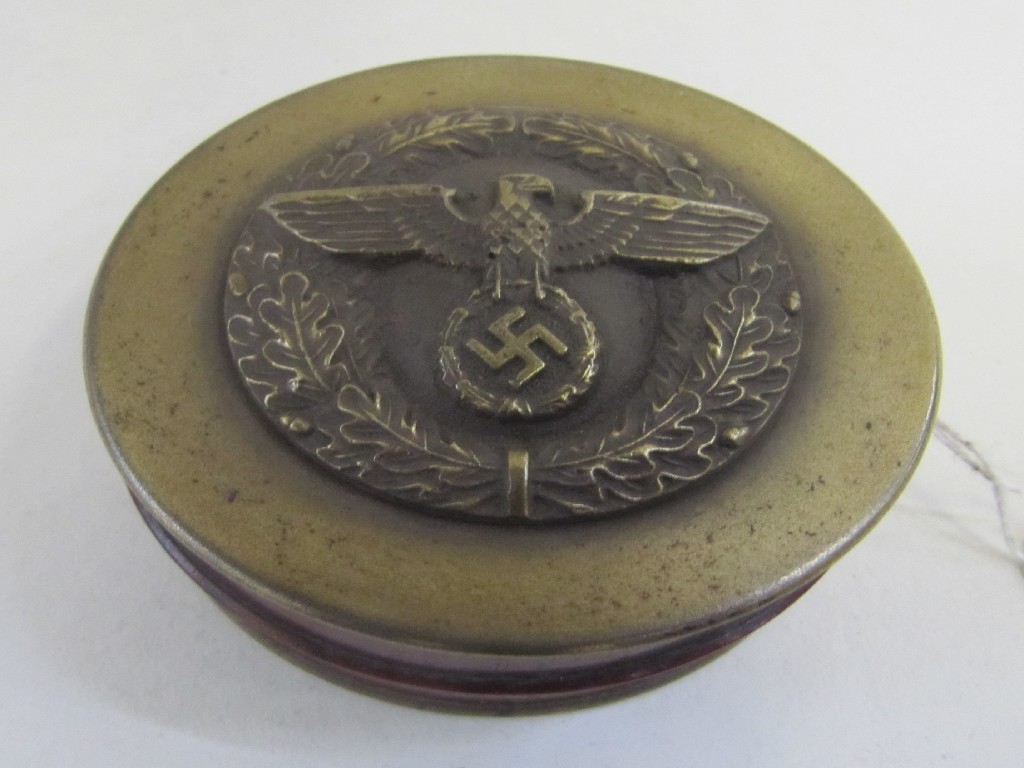 Appraisal: Gilt metal box mounted with and Eagle and Swastika emblem