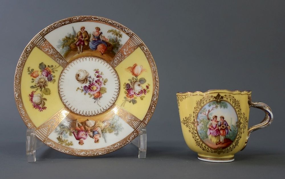 Appraisal: Meissen Cup and Saucer with Colorful Vignette Meissen cup and